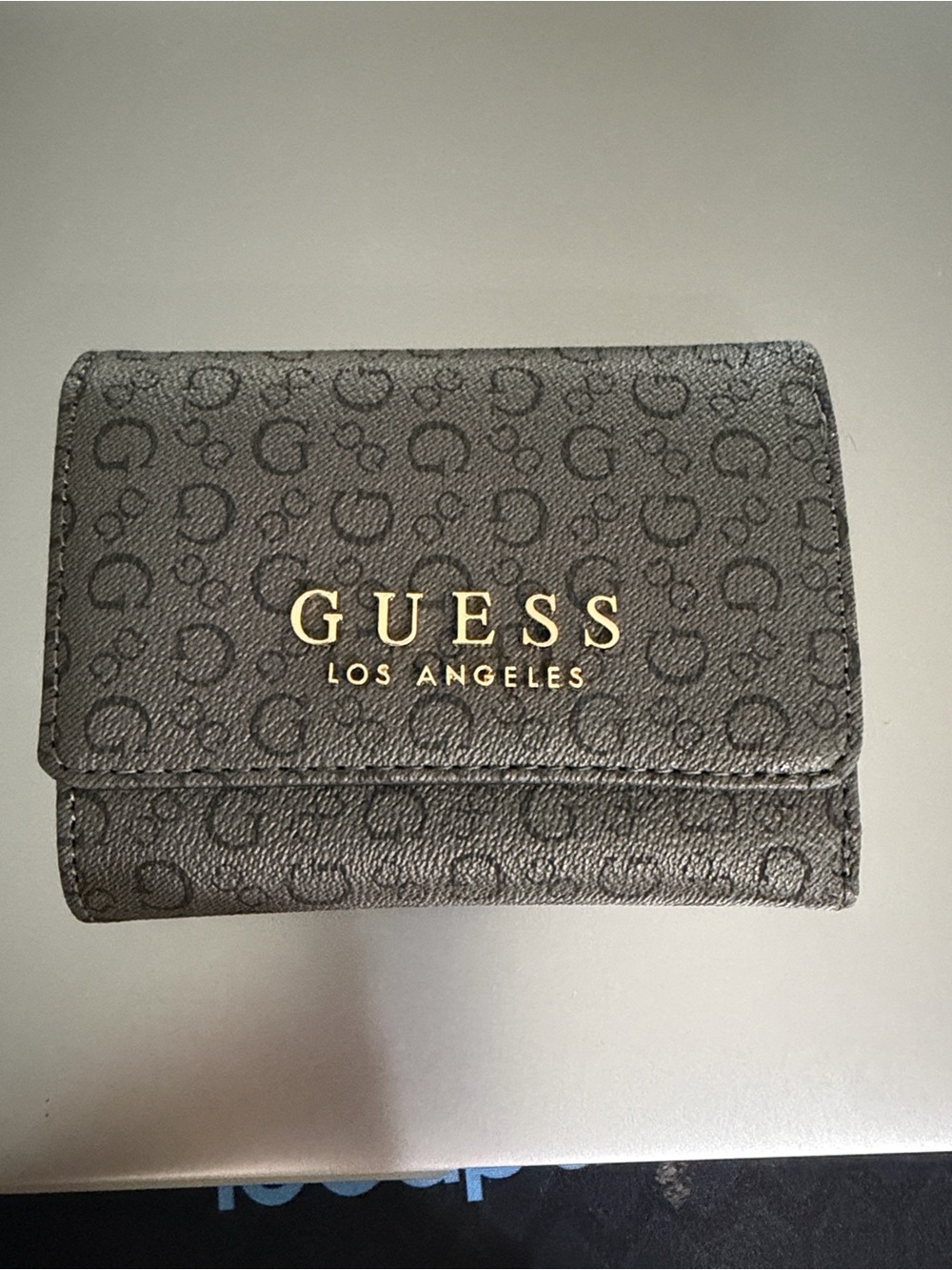 GUESS Black Monogram Trifold Wallet with Gold Logo